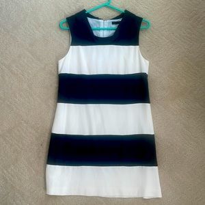 Sheath dress with pockets.